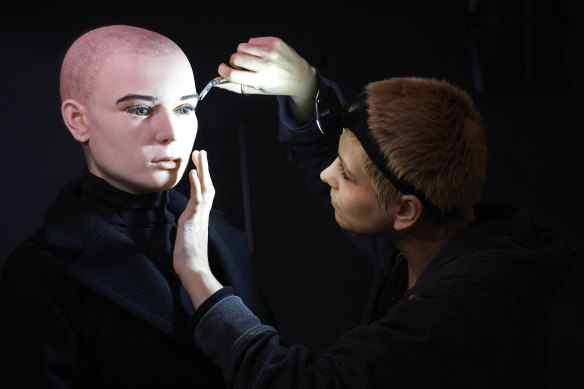 Artistic coordinator Mel Creek applies the finishing touches on a wax figure of the late singer Sinead O’Connor at the National Wax Museum Plus in Dublin.
