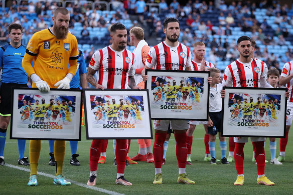 Andrew Redmayne, Jamie Maclaren, Mathew Leckie and Marco Tilio of the Socceroos were acknowledged before the match.