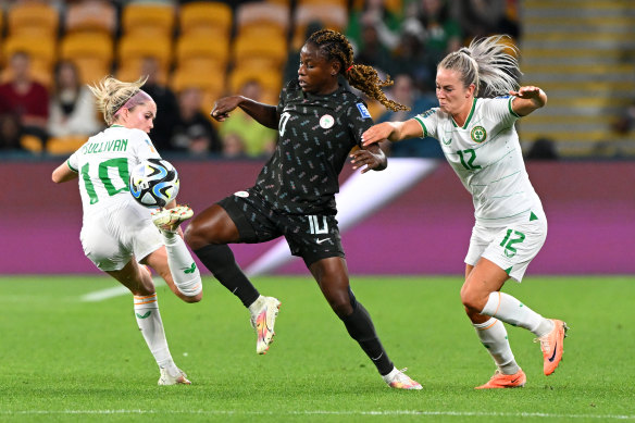 Christy Ucheibe of Nigeria is challenged by Denise O’Sullivan and Lily Agg of Republic of Ireland.