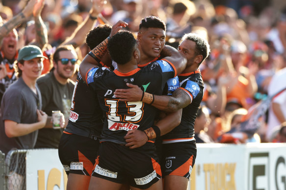 Stefano Utoikamanu celebrates after scoring the opening try for the Tigers.