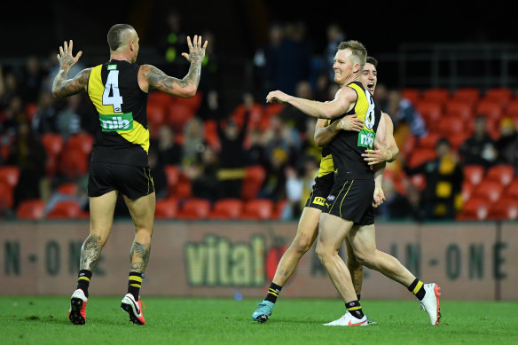 Jack Riewoldt celebrates a goal for the Tigers in their win over Geelong on Friday night.