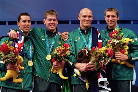 William Kirby, Todd Pearson, Michael Klim (holding Fatso the Fat-Arsed Wombat) and Ian Thorpe celebrate their gold medal in the Men’s 4x200m relay.
