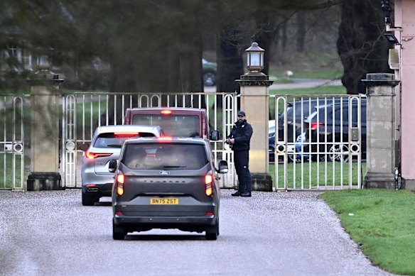 Unmarked vehicles enter the Royal Lodge property following Andrew’s arrest earlier this year.