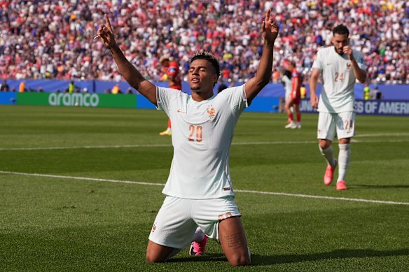 Desire Doue celebrates after scoring his side’s fourth goal.
