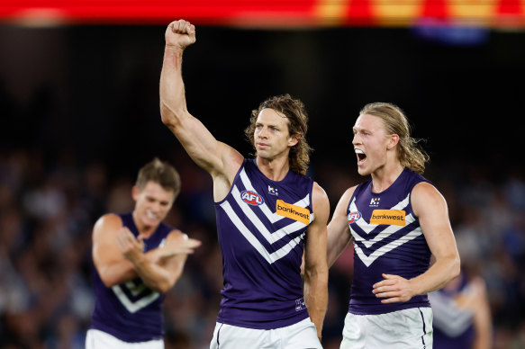 Nat Fyfe celebrates a goal during the Dockers’ comeback win against North Melbourne.