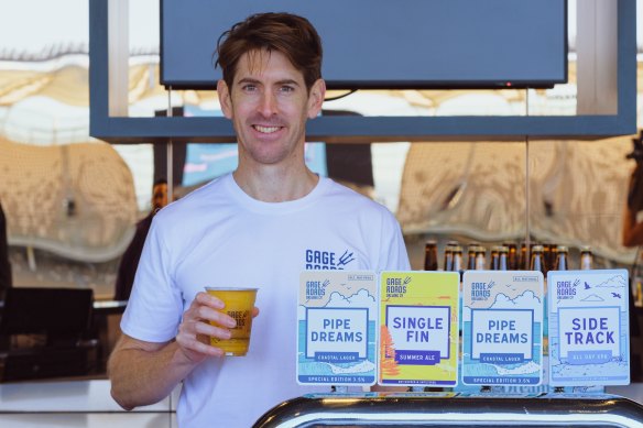 Gage Roads head brewer Ross Brown with the craft brewery's range of beers on tap at Optus Stadium this year. 
