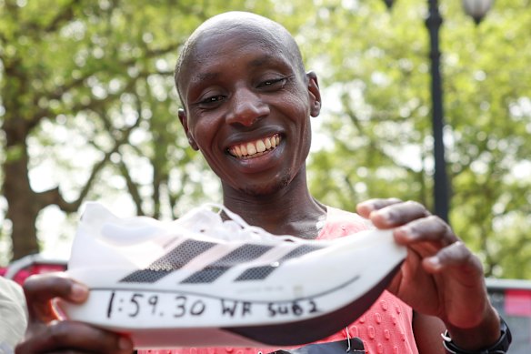 Sabastian Sawe celebrates with his adidas supershoe