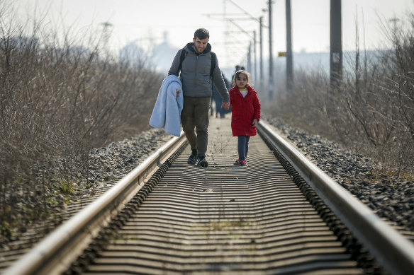 Migrants head for Greece near the Pazarakule border crossing in Edirne, Turkey, on Sunday.