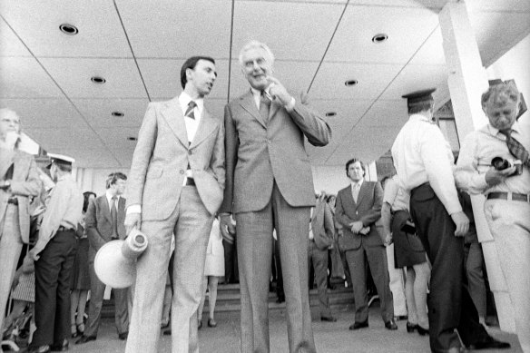 Gough Whitlam addresses the crowd from the steps of Parliament House, Canberra, November 1975 with a young Paul Keating. 