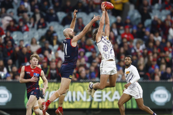 Luke Jackson goes up against Max Gawn.