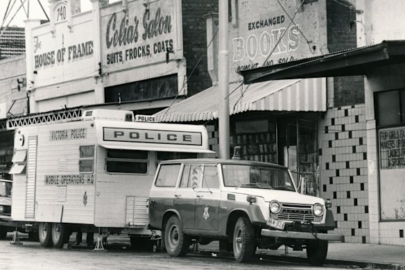 A police van parked outside the crime scene at Bookshop Exchange on High Street, Thornbury.