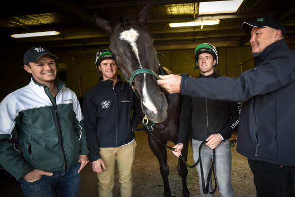 David Hayes (right), pictured with sons Ben, J.D. and Will in 2016.