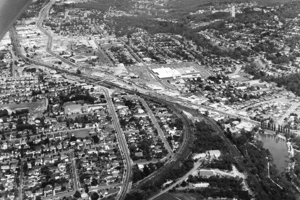 An aerial view of Ringwood in 1969: Shows the railway station, Town Hall and Eastland shopping centre in the centre of the photograph.