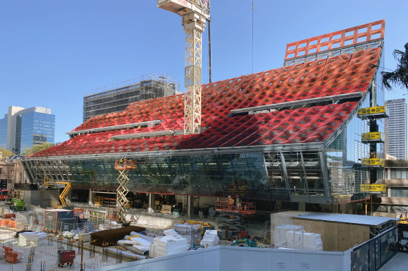 Phive, a bold red building designed to follow the course of the sun,  was designed by a team, including Manuelle  Gautrand Architecture in France with Australian practices, Lacoste+Stevenson and DesignInc.