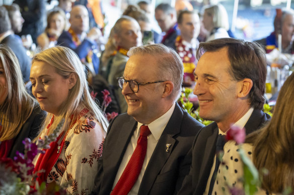 Jodie Haydon and Anthony Albanese take pride of place next to Andrew Dillon at the AFL Commission lunch in the Olympic Room at the MCG on Saturday.