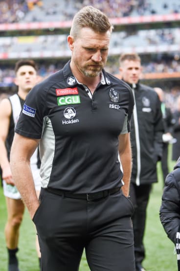Nathan Buckley leaves the field.
