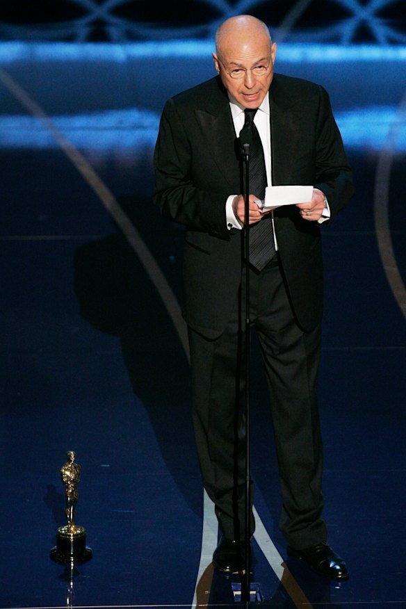 Actor Alan Arkin accepts the Oscar for best supporting actor.