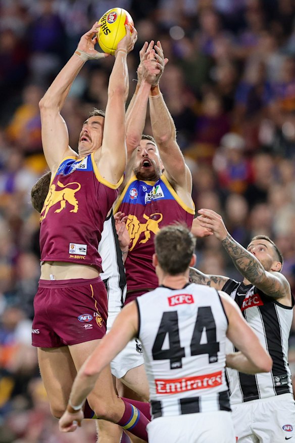 Joe Daniher (left) has put off shoulder surgery.
