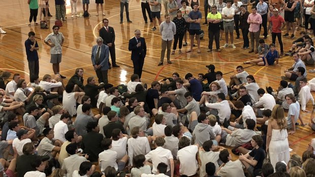 Trinity Grammar headmaster Michael Davies addresses the school community. 