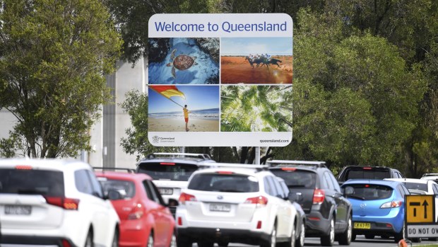 Long queues have plagued motorists  arriving at the  Queensland border   checkpoints.