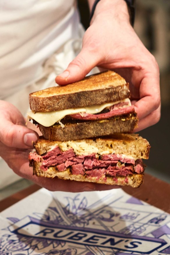 The Reuben sandwich features house-made pastrami.