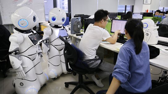 Canbot employees testing robots in Shenzhen.