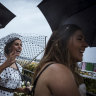 Downpour dampens Derby Day punters and anti-racing protests