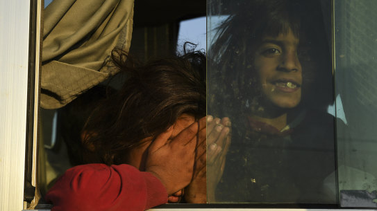 Syrian refugees are taken on buses to Bardarash Refugee Camp in Iraqi Kurdistan.