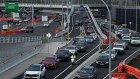 Cars queue to try and get onto the Anzac Bridge after the Rozelle Interchange opened in late November.