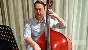 Cameron Holland playing double bass: “I’ve been lucky to cover most genres but focus on classical and jazz.”
