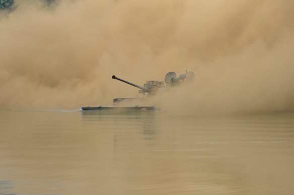 South Korea’s K21 infantry fighting vehicle sails to shores in a smoke during the combined wet gap crossing military drill between South Korea and the United States as a part of the Ulchi Freedom Shield military exercise in Cheorwon, South Korea.