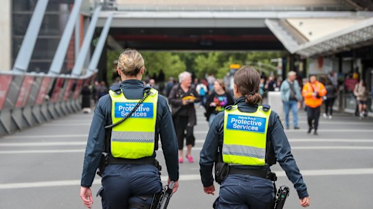 Protective Services Officers patrol near Southern Cross Station on Monday.