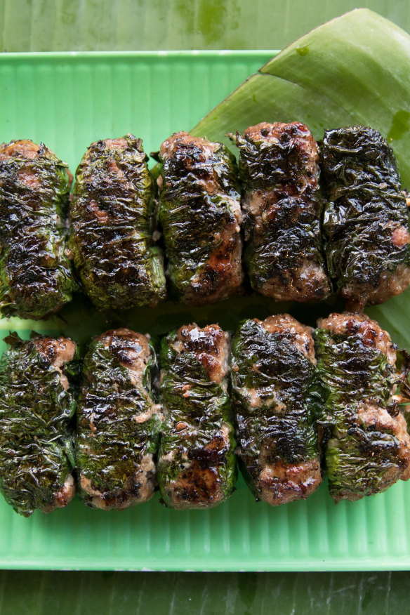 Beef skewers wrapped in betel leaf.