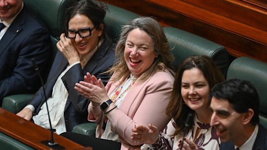 Labor MP Emma Vulin, between Health Minister Mary-Anne Thomas (left) and Belinda Wilson, spoke about living with MND during debate about voluntary assisted dying amendments.