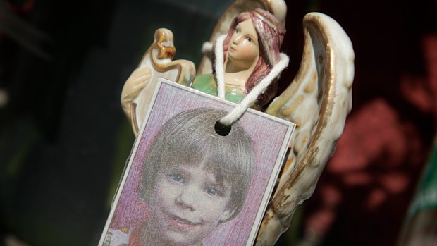 A photograph of Etan Patz at a makeshift memorial in the SoHo neighborhood of New York in 2012.