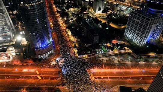 Israelis protest against Prime Minister Benjamin Netanyahu’s new right-wing coalition and its proposed judicial reforms to reduce powers of the Supreme Court, in Tel Aviv, Israel, on Saturday.
