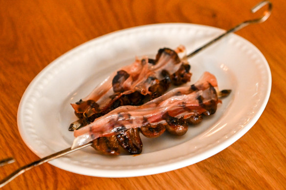 Duck heart skewers with sansho pepper and lardo.