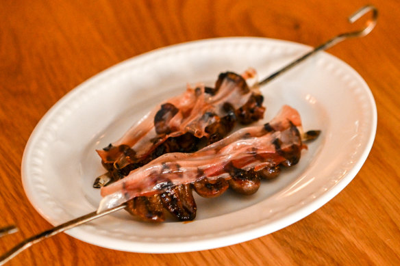 Duck heart skewers with sansho pepper and lardo.