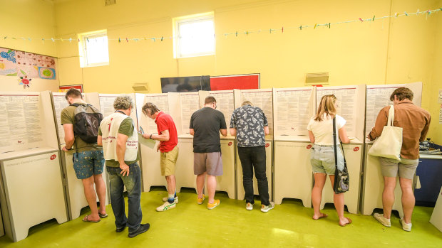 Voters at a polling booth at Fitzroy North Primary School.