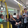 Passengers onboard the first official Brisbane Metro service.