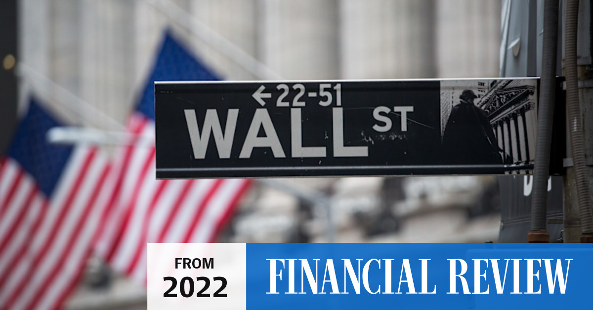 Wall St closes mixed, bond yields surge as rate bets rise