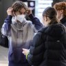Free quality face masks handed out to Melbourne transport users