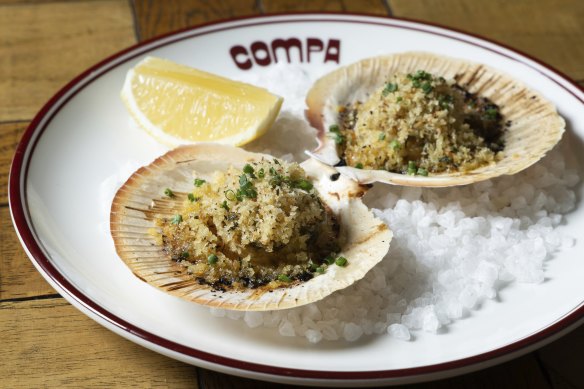 Lightly cooked Abrolhos Island scallops are served on the shell with herb butter. 