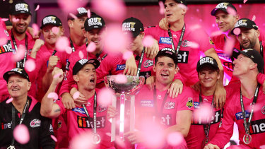 The Sydney Sixers celebrate winning last summer's BBL.