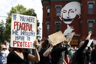 Demonstrators protest after the death of George Floyd in Washington. 