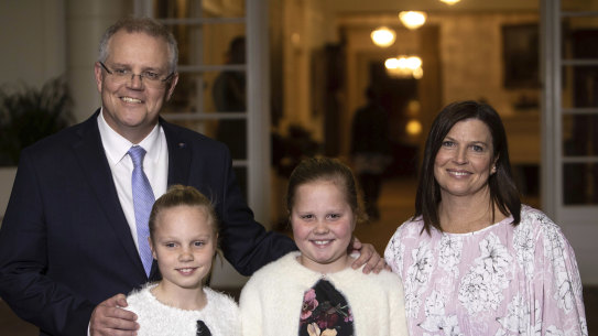 New Australian Prime Minister Scott Morrison with daughters, Abigail, second from right, and Lily, second from left, and wife Jenny after being sworn in at Government House. 