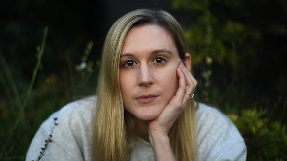 Teacher Michelle Parker is pleased to be back in the classroom and is managing mandated mask-wearing and PPE requirements. 