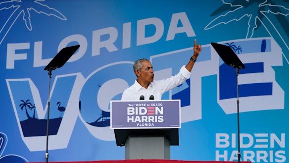 Former president Barack Obama speaks as he campaigns for Democratic presidential candidate former Vice President Joe Biden at Florida International University.