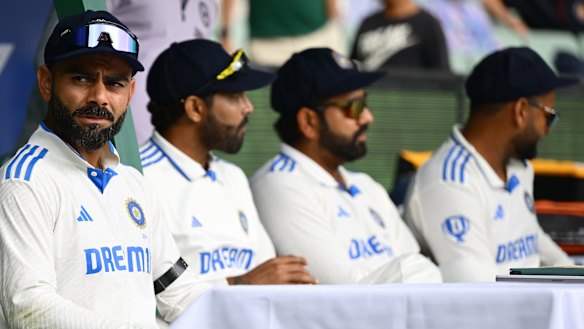 Virat Kohli (left) was fined 20 per cent of his match fee and given a demerit point for making physical contact with Australian debutant Sam Konstas.