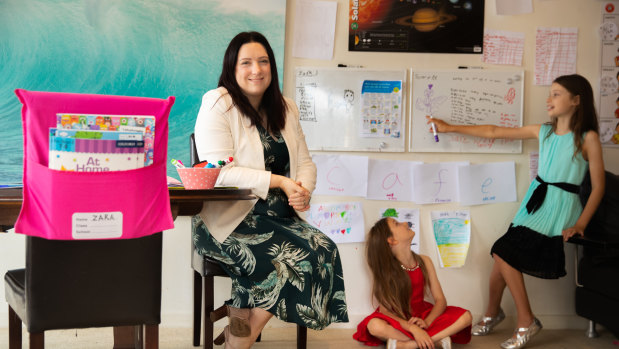 Robyn Hill with daughters Zara, 7, and Scarlette, 9. 